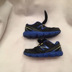 Boys size 10 New Balance 750 shoes